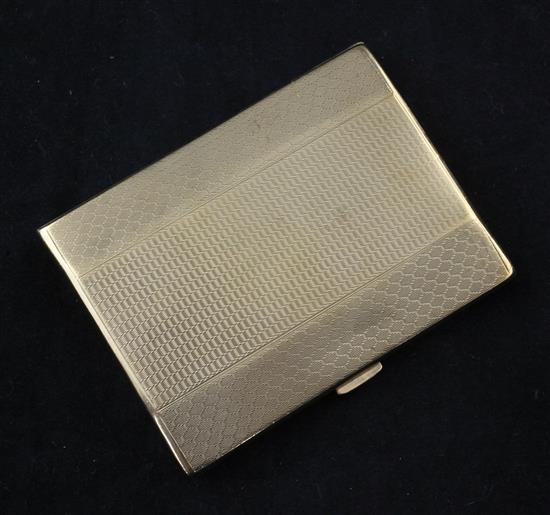 A late 1920s engine turned 9ct gold cigarette case, 3.5in.